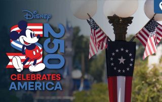 Mickey Mouse proudly stands beside a bold “250” logo draped in red, white, and blue stripes for Disney’s “Celebrates America” event, marking the nation’s 250th anniversary. Behind him, patriotic flags and decorations adorn a lamppost on Main Street, U.S.A., setting a festive scene for Disney’s upcoming coast-to-coast celebration.